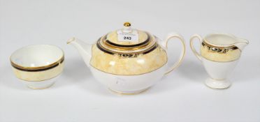 A 'Cornucopia' pattern Wedgwood teapot, milk jug and sugar basin