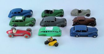 Eleven post war Dinky Diecast vehicles, including a green Alvis, blue Oldsmobile,