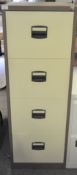 A modern filing cabinet of brown and cream metal with four sliding drawers, key present,