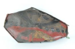 A large unusual African Tribal skin shield, with wooden handle to reverse,