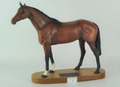 A Beswick model of 'Racehorse', standing on a wooden plinth with plaque,