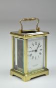 A vintage S Smith & Son brass cased carriage clock,