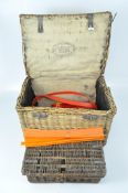 A large wicker basket with metal claps and fabric lining, 50cm x 76cm x 53cm, and more