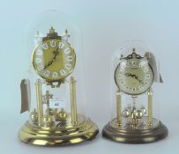 Two contemporary skeleton clocks, metal dials with Roman numerals and gilt frames