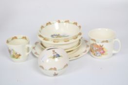 A collection of Royal Doulton Bunnykins ceramics including cups, plates,
