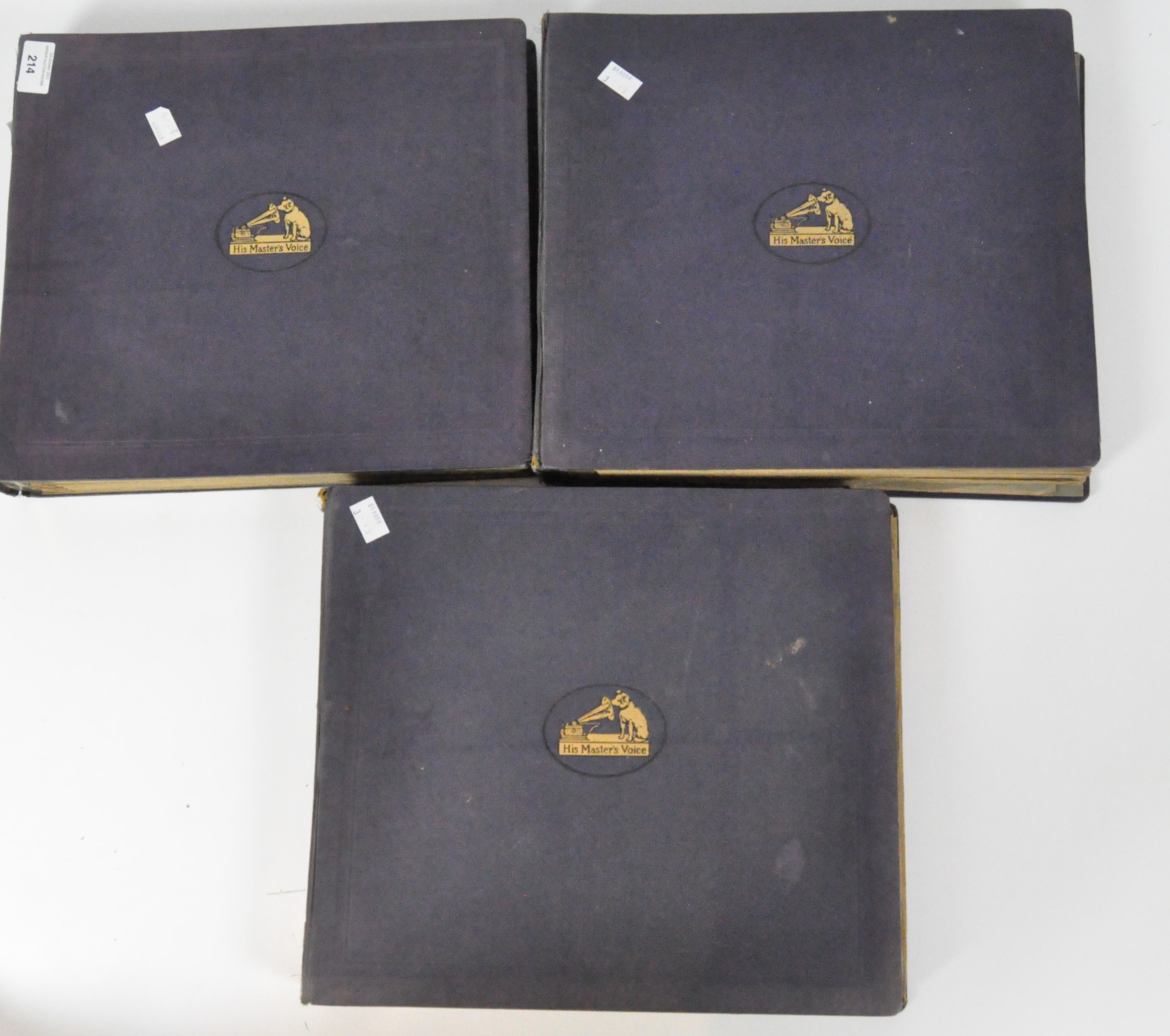 Three filled blue binders from RCA His Master's Voice to hold 12 records each,
