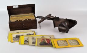 85 antique Stereoview photographs in card frames, placed in a period wooden storage box,