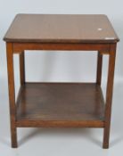 A small pine table, with square top and supports,