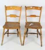 Two elm kitchen chairs on turned supports,