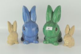 A group of four Sylvac rabbits, including a large blue rabbit, 1028,