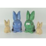 A group of four Sylvac rabbits, including a large blue rabbit, 1028,