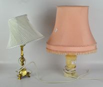 Two table lamps, one with a stone base and pink shade, height 48cm,