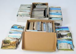 Four boxes of British postcards, mostly from the 1960's,