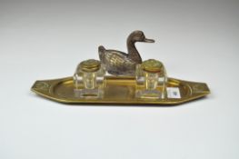 An Art Nouveau dual brass inkwell on stand,