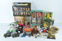 A selection of contemporary collectables, including a Buzz Lightyear model,