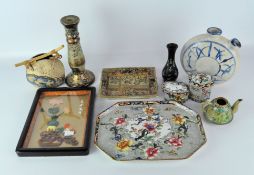 A collection of Asian ceramics, including dishes vases, pots and more, some with printed,