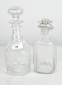 Two moulded glass decanters, both with stoppers, one on a circular base,