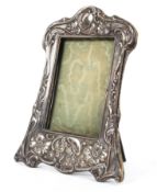 A sterling silver picture frame with Art nouveau style decoration by Samuel M Levy Birmingham 1910
