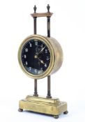 A late 19th/early 20th century pillar gravity mantel clock, weight driven movement,