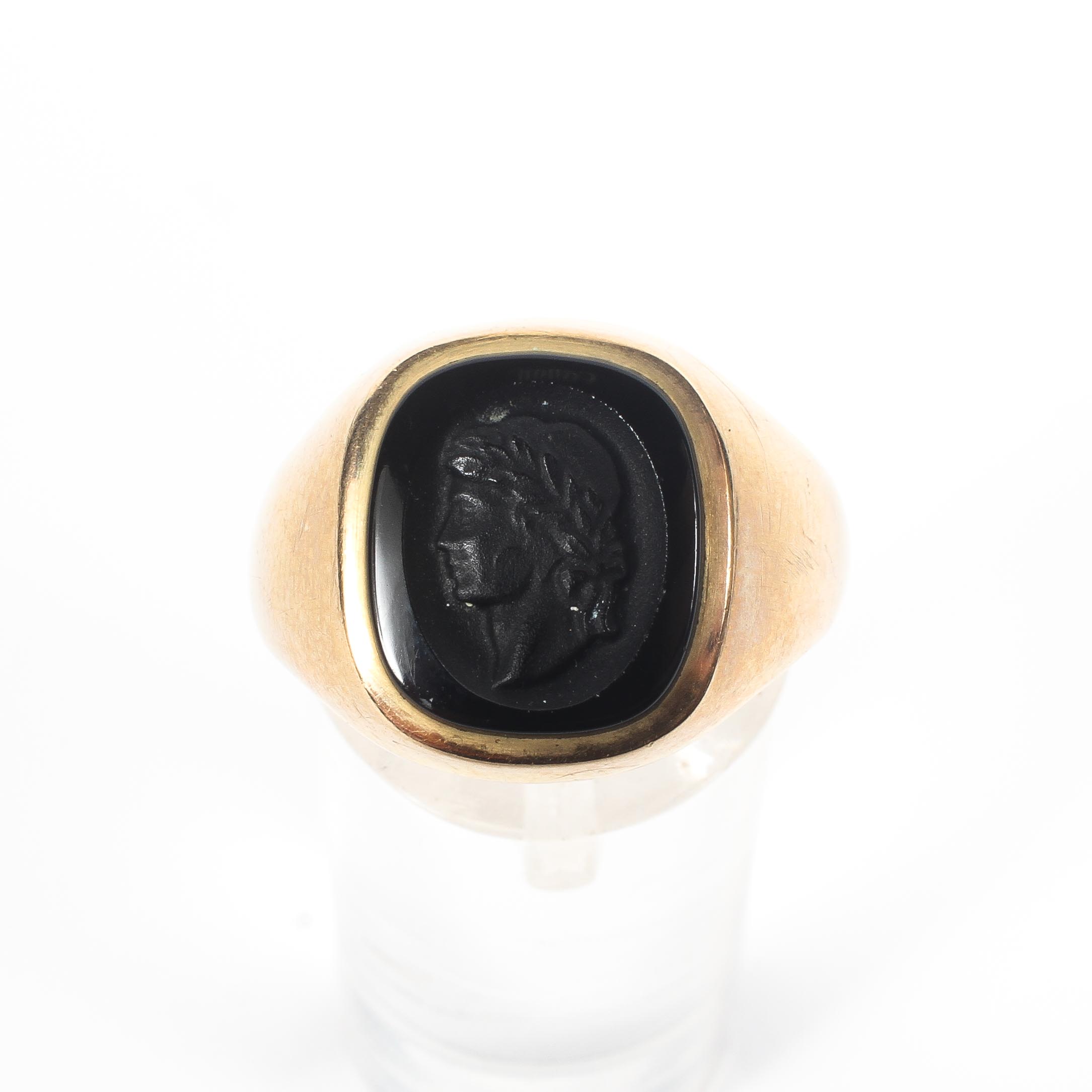 A yellow metal signet ring set with a cushion shaped embossed seal onyx. - Image 2 of 4