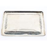 A sterling silver rectangular card tray with raised floral border, Sheffield 1985 26cm x 17.5cm.