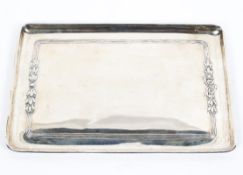 A sterling silver rectangular card tray with raised floral border, Sheffield 1985 26cm x 17.5cm.