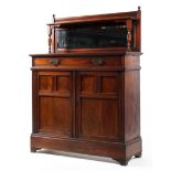 A late Victorian mahogany sideboard, with mirrored back and galleried shelf on baluster supports,