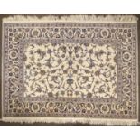 A Nain style rug, double border with central floral panel,