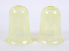 A pair of vaseline glass shades in opalescent yellow, late 19th/early 20th century,