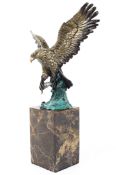 Burnett, a bronze sculpture of an eagle on stone base, 20th century,