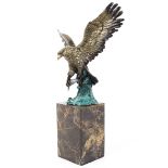 Burnett, a bronze sculpture of an eagle on stone base, 20th century,