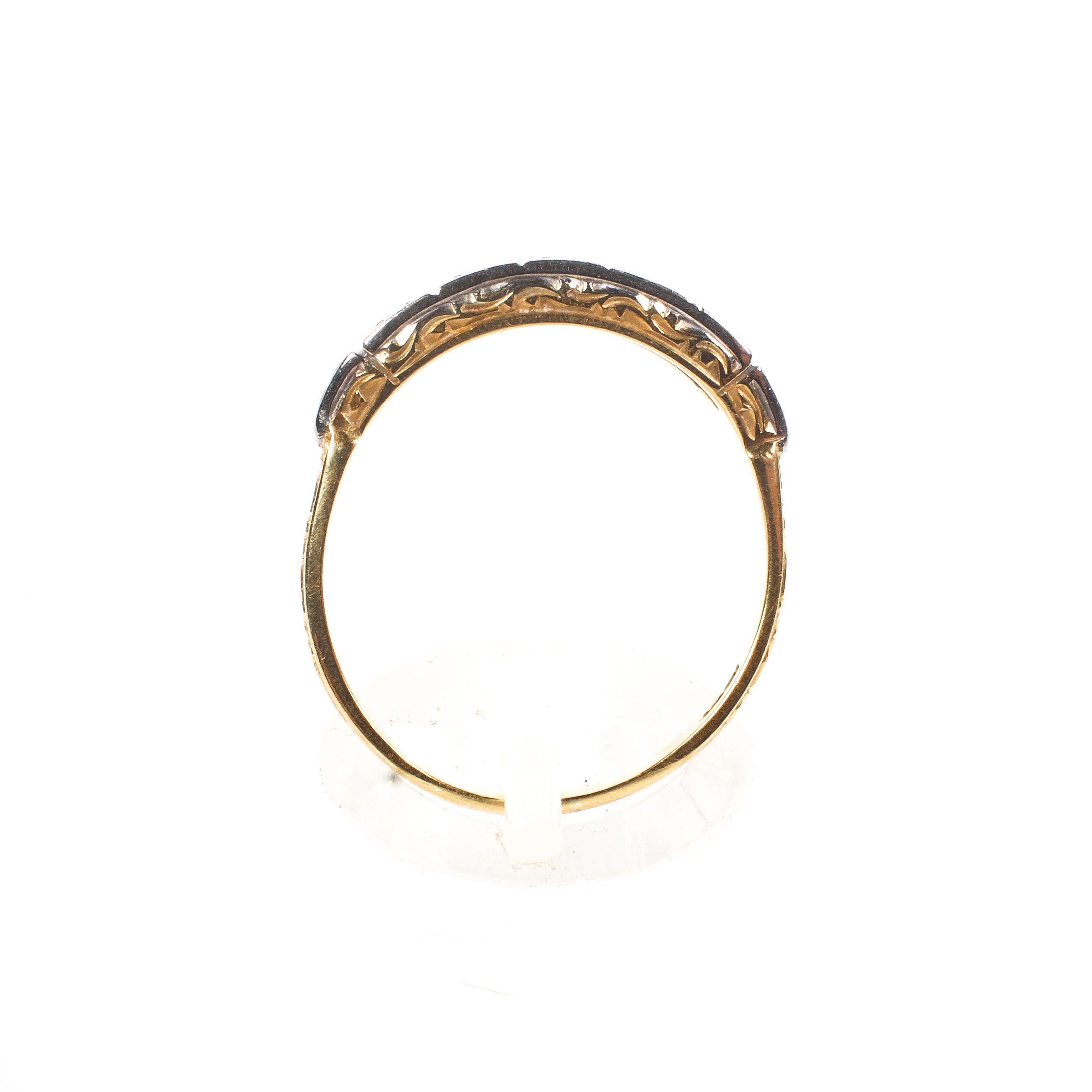 A yellow and white metal ring set with single cut diamonds estimated to weigh a total of 0.05cts. - Image 3 of 4