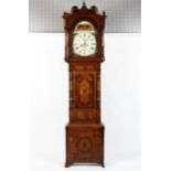 A 19th century oak long case clock with arched white face and Roman numeral markers by L
