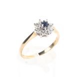 A 9ct gold sapphire and diamond flower ring.