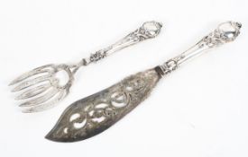 A sterling silver handled cake knife and fork set,