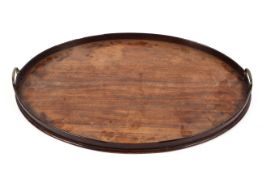 A mahogany brass handled oval tray, 19th century,