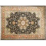 A large Nain style rug black ground with central floral medallion. 304cm x 200cm.