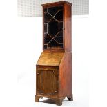 A Georgian mahogany bureau bookcase with glazed astragals, enclosing two shelves and two drawers,