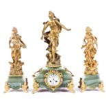 A French gilt metal and onyx mouted figural three piece clock garniture, late 19th century,