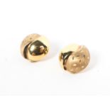 A pair of 9ct gold circular clip on earrings measuring approximately 14.5mm diameter. Birmingham.