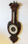 An early 20th century mahogany banjo shaped barometer 95cm x 32cm