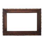 A 19th century carved oak wall mirror,