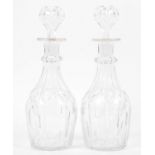 A pair of early to mid 19th century decanters and stoppers, each of baluster form,