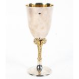 A sterling silver commemorative goblet with gilt Fleur de Lys stem, and gilt interior,