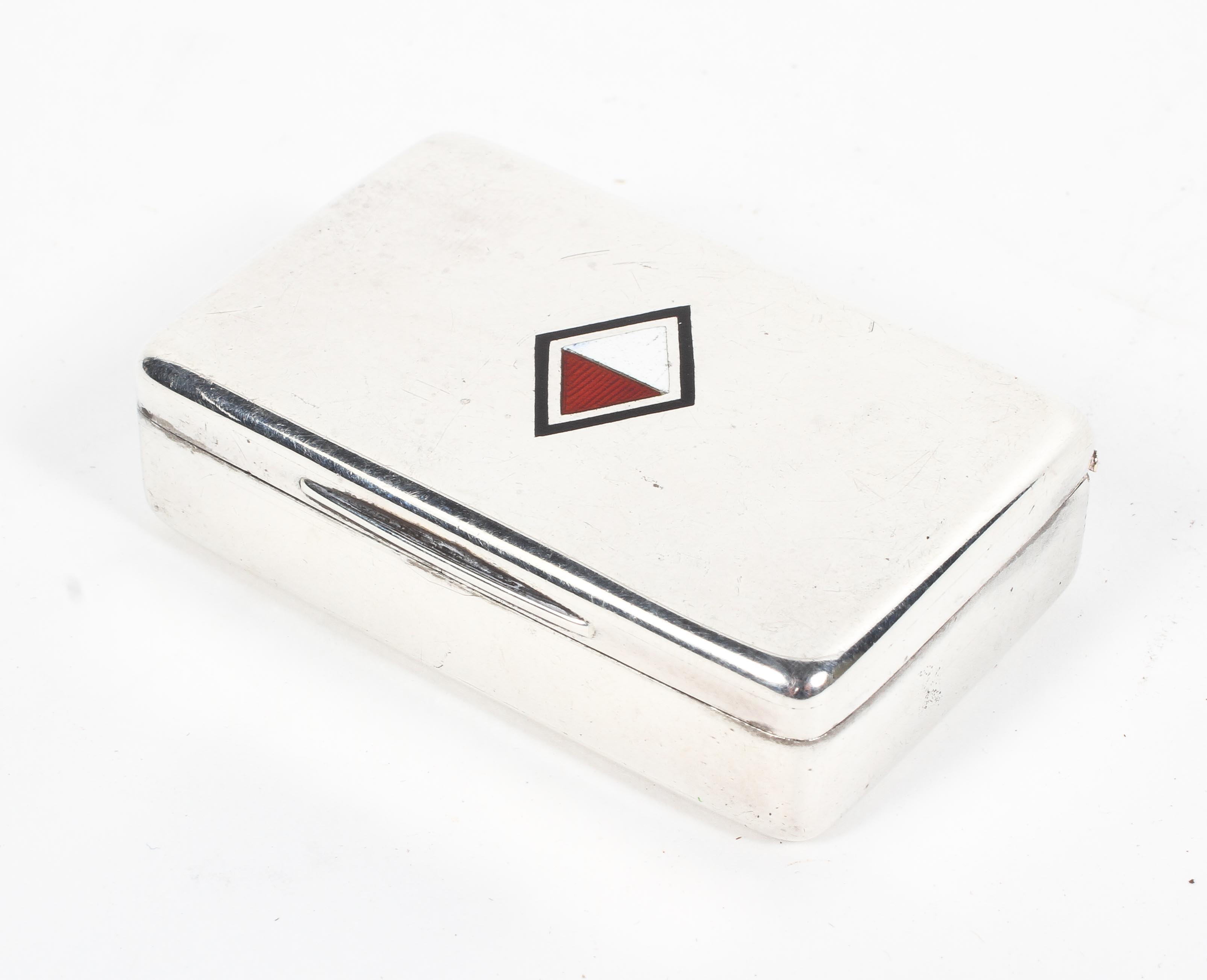 A sterling silver and enamel snuff box with gilt interior, 5.5cm x 3.5cm x 1.5cm 1.20ozt.