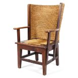 An Orkney oak framed chair, early 20th century, with curved high rush back and drop-in rush seat,