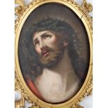 A Continental porcelain plaque of Christ, 19th century, in the Berlin (KMP) style,