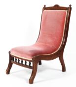 A Victorian stained oak nursing chair,