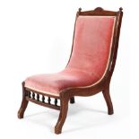 A Victorian stained oak nursing chair,