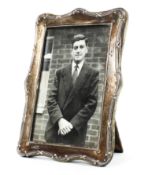 A sterling silver desk top photo frame. 16cm x 11cm.